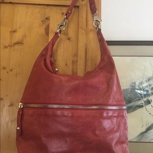 Red Hobo distressed leather shoulder bag.